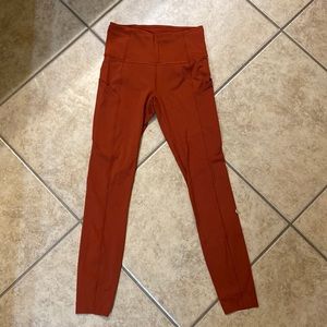 Lululemon leggings. Burnt orange color. Size 4. Inseam approx 23”.